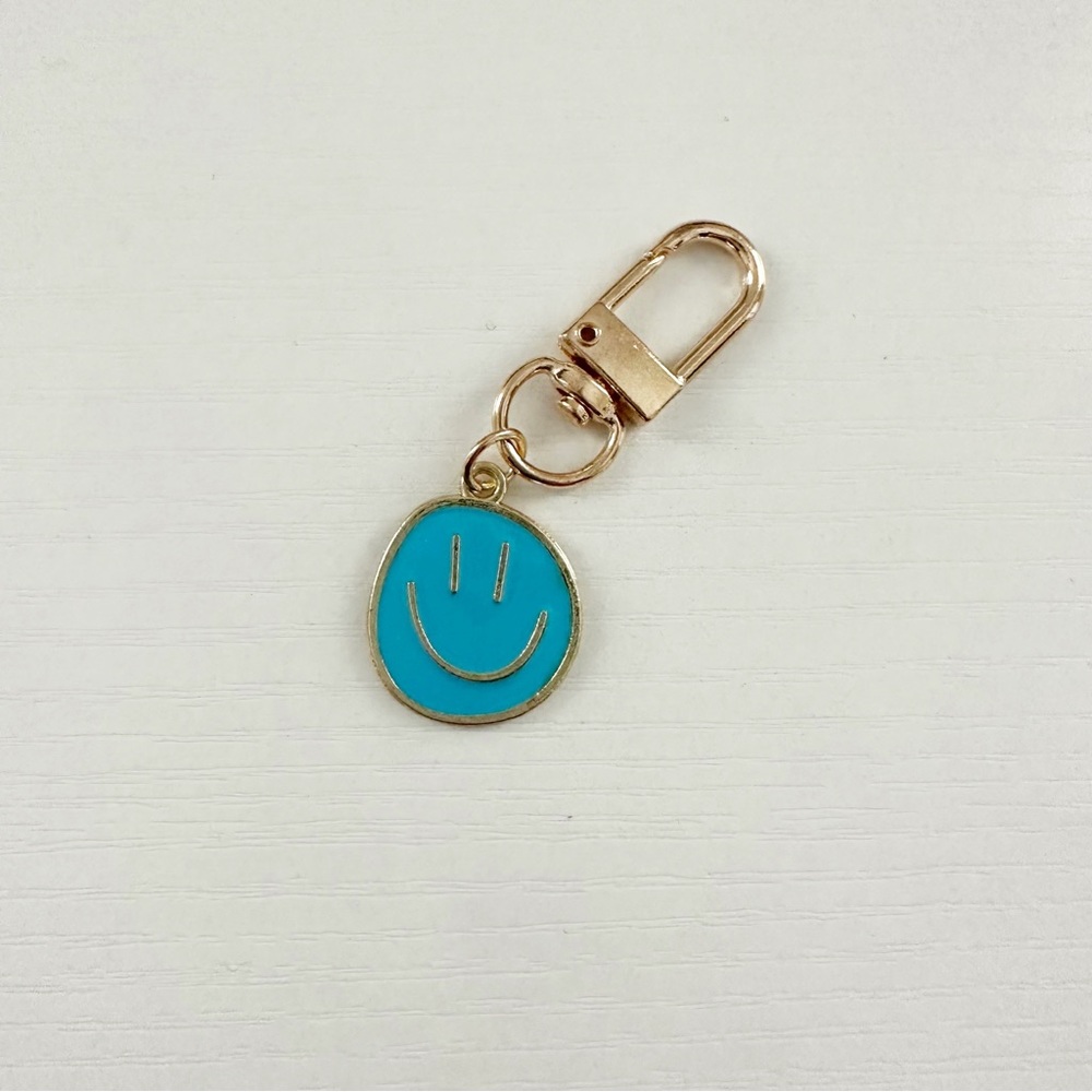 NEW Blue Smiley Face Keychain